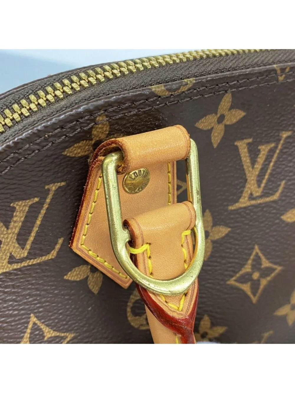 Louis Vuitton Monogram Alma BB Brown Handbag